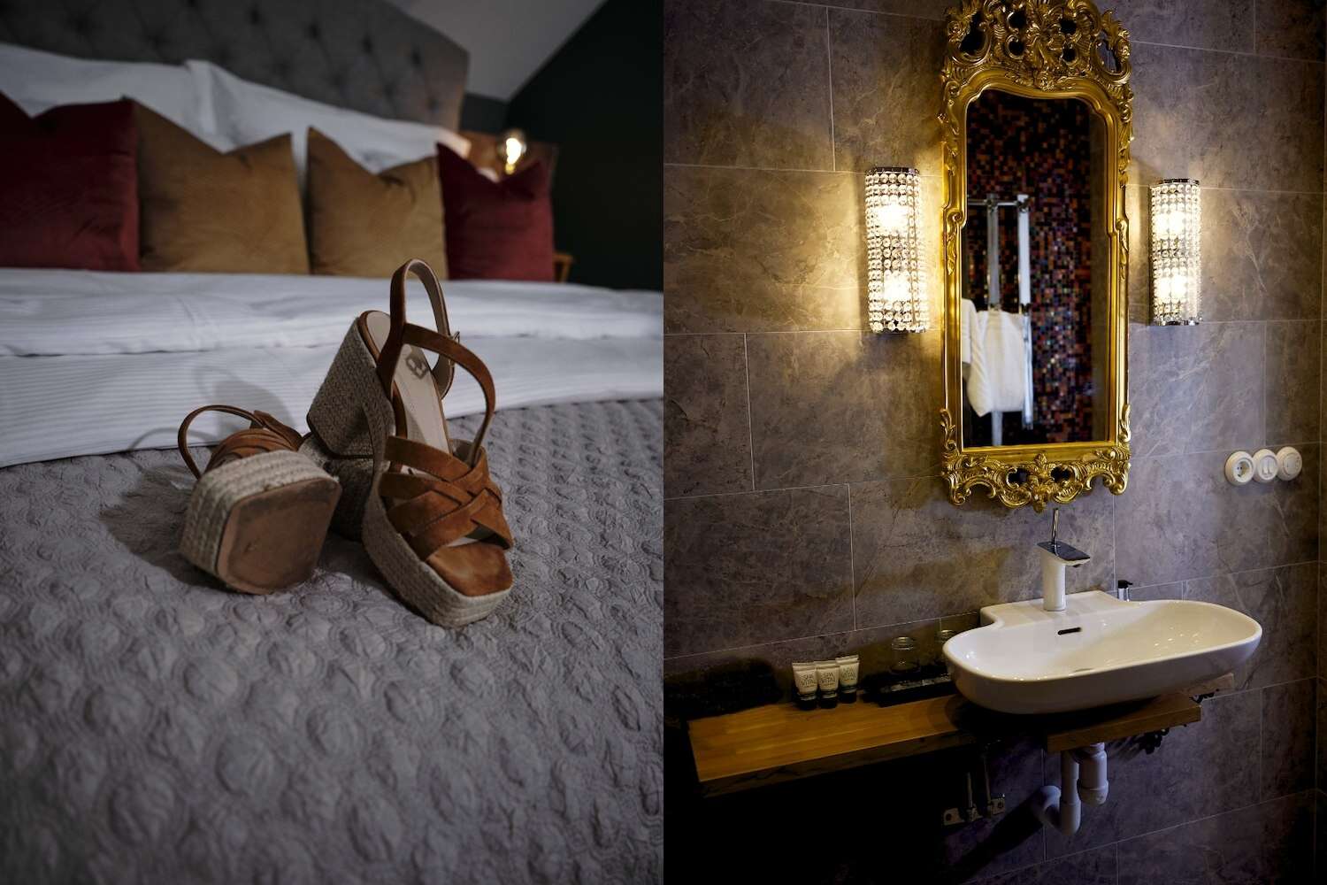 Bruna klackskor på säng samt badrum med guldspegel på Grenna Hotell